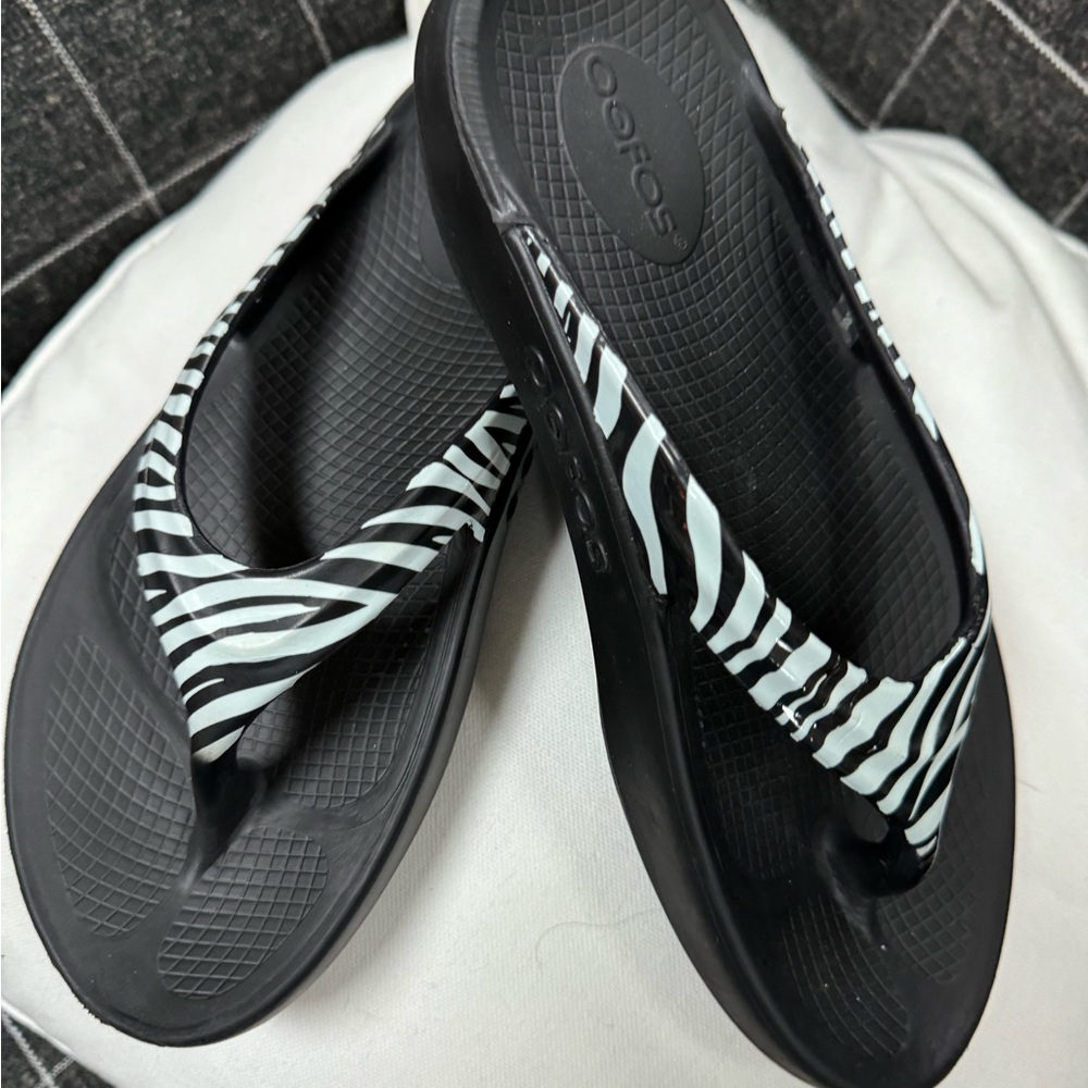 Oofos zebra flip flops